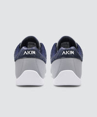 Back view of grey AKIN driving shoe for car enthusiasts.