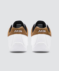 Back view of white AKIN driving shoe for car enthusiasts. 